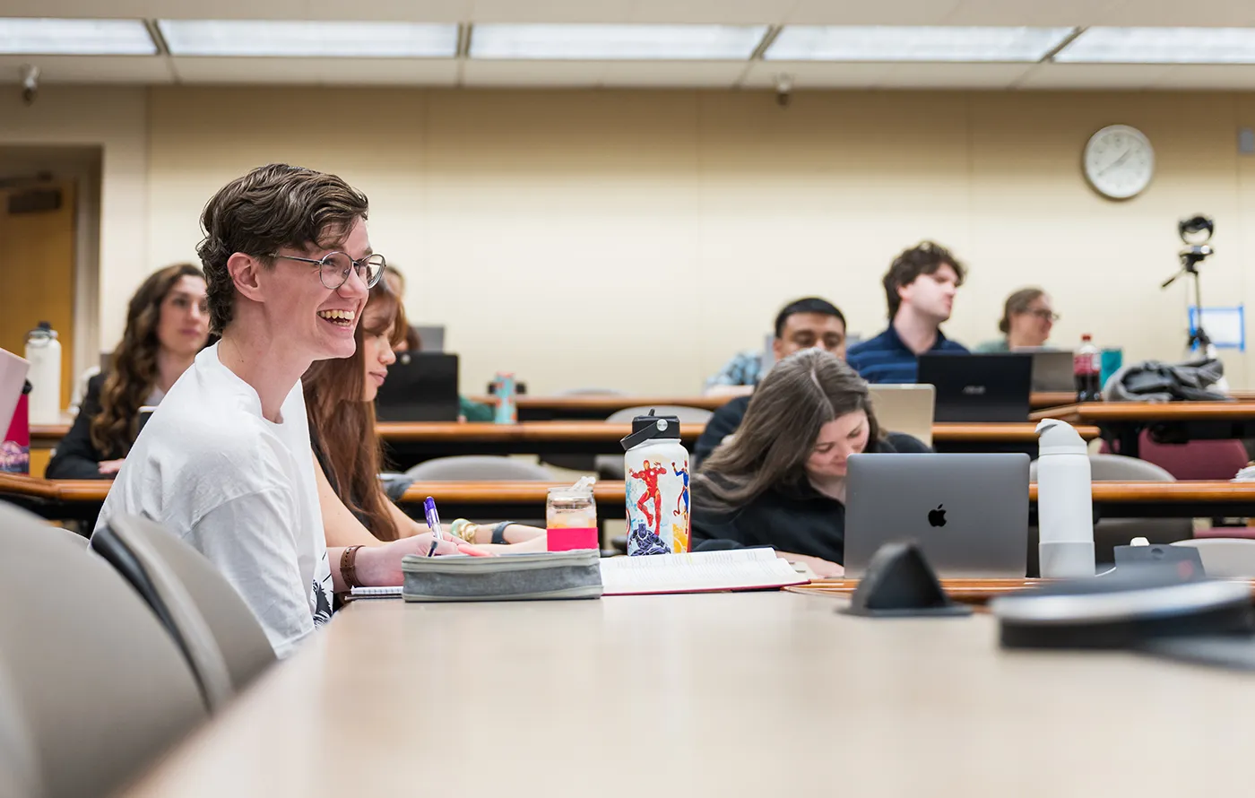 Student laughing in class