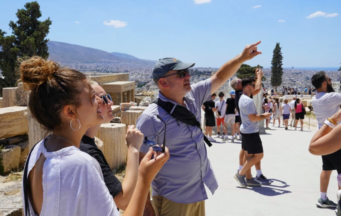 Scott Pike with students in Greece