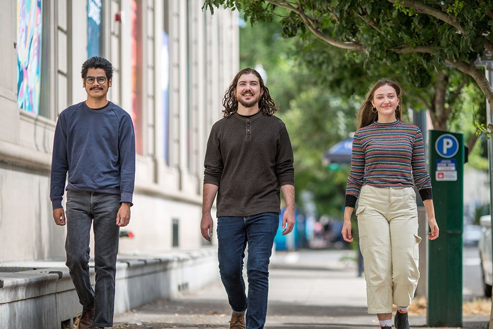 3 PNCA student scholarship winners walking down street