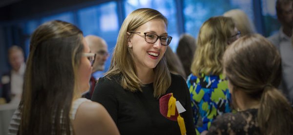 Prospective students mingling at a recruitment event