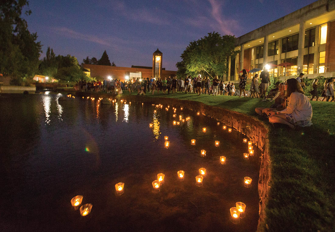 Candles floating on Mill Stream